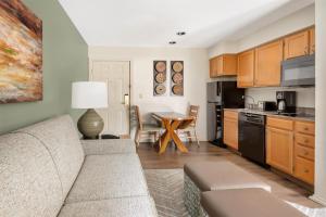 a living room with a couch and a kitchen at Hilton Vacation Club Villas de Santa Fe in Santa Fe