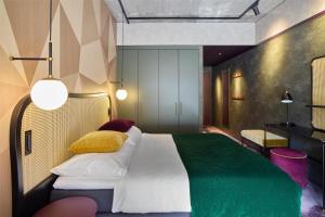 Uma cama ou camas num quarto em Me and All Hotel Flims, by Hyatt