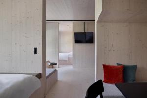 Uma cama ou camas num quarto em Me and All Hotel Flims, by Hyatt