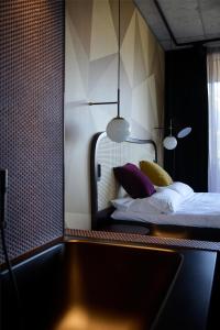 Uma cama ou camas num quarto em Me and All Hotel Flims, by Hyatt