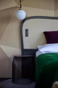Uma cama ou camas num quarto em Me and All Hotel Flims, by Hyatt