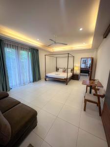 Ένα ή περισσότερα κρεβάτια σε δωμάτιο στο Baan Thai pool villa +12 φωτογραφίες
