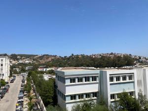 an aerial view of a building and a street at Coastal Escape Tangier in Tangier