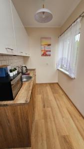 Kuchyňa alebo kuchynka v ubytovaní Apartament Bursztynowy