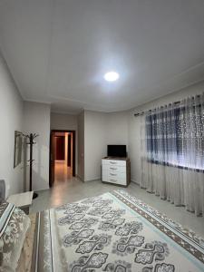 TV i/ili multimedijalni sistem u objektu 3 Bedrooms Penthouse Golem +6 fotografija