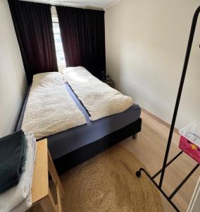 Postel nebo postele na pokoji v ubytování Buktarommet