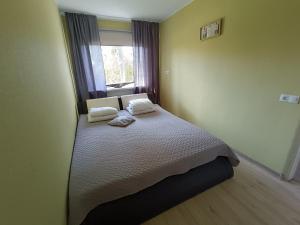 Postel nebo postele na pokoji v ubytování Rahu34