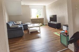 TV a/nebo společenská místnost v ubytování 100 qm DG Wohnung 《Kehr wieder》Bexbach Saarland