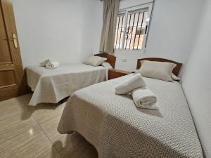 Postel nebo postele na pokoji v ubytování Regata Playa + 34 fotografií