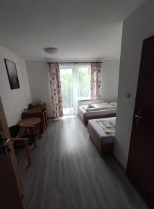 Postel nebo postele na pokoji v ubytování Veno- Niechorze