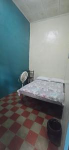 Postel nebo postele na pokoji v ubytování White Rabbit Hostal