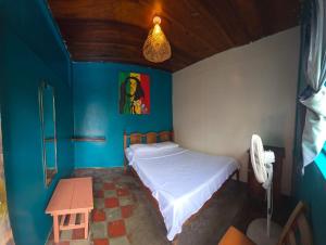 Postel nebo postele na pokoji v ubytování White Rabbit Hostal