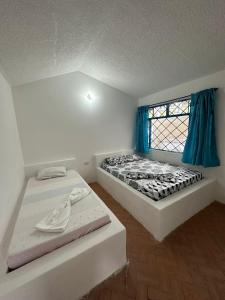 Postel nebo postele na pokoji v ubytování Finca Hotel Bella Vista