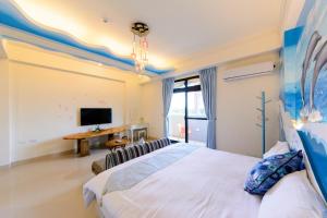 Letto o letti in una camera di BeautyFlower Cottage