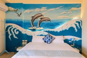 Letto o letti in una camera di BeautyFlower Cottage