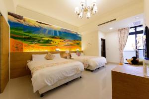 Letto o letti in una camera di BeautyFlower Cottage