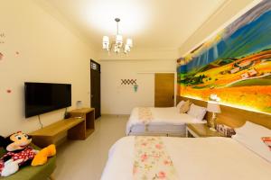 TV o dispositivi per l'intrattenimento presso BeautyFlower Cottage
