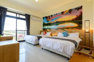 Letto o letti in una camera di BeautyFlower Cottage