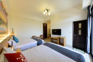 Letto o letti in una camera di BeautyFlower Cottage