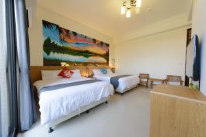 Letto o letti in una camera di BeautyFlower Cottage