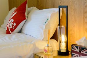 Letto o letti in una camera di BeautyFlower Cottage