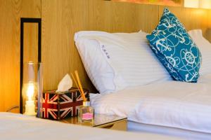 Letto o letti in una camera di BeautyFlower Cottage