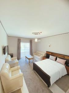 Postel nebo postele na pokoji v ubytování Hotel Tanger Room