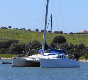 a sailboat is docked in the water at Cabines Catamaran Breakfast-Brunch Included, Optional Lunch & Dinner in Alvor