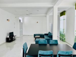 Posezení v ubytování Pearl Residencies Matara