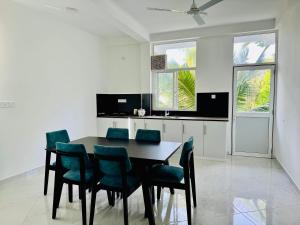 Kuchyň nebo kuchyňský kout v ubytování Pearl Residencies Matara