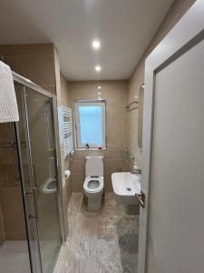 Ένα μπάνιο στο Apartment in Cashel