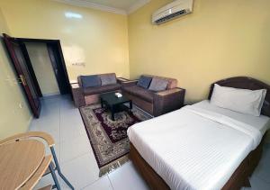 Posezení v ubytování Jawharet Al Kheir Furnished Apartments