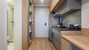 A cozinha ou cozinha compacta de 360 Ambience Vila Mariana