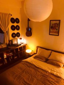 Una cama o camas en una habitación de Moodscape Homestay