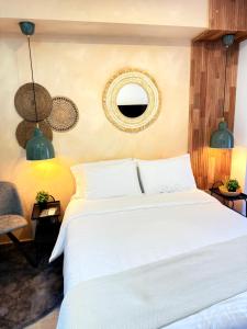 Ένα ή περισσότερα κρεβάτια σε δωμάτιο στο Apto boho Design edificio bit
