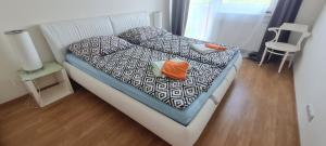 Posteľ alebo postele v izbe v ubytovaní Prostorný 3 pokojový apartmán s dvěma terasami