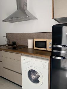 Η κουζίνα ή μικρή κουζίνα στο Apartamento Alpe Almagro +19 φωτογραφίες