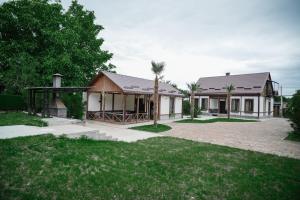 a house with a gazebo in a yard at My House Resort in Dsegh