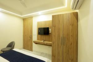 TV a/nebo společenská místnost v ubytování Hotel Glace By Tranquil