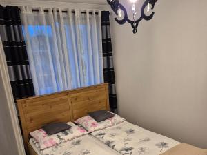 Posteľ alebo postele v izbe v ubytovaní Noclegi "LAS WYPAS" Trzcianka