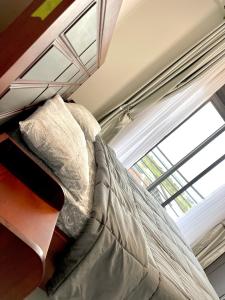 Postel nebo postele na pokoji v ubytování Prime nest properties
