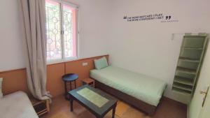 Postel nebo postele na pokoji v ubytování FAKHARA Hostel