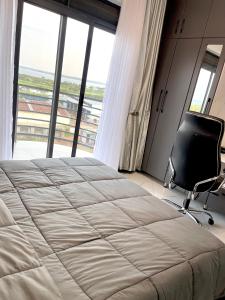 Postel nebo postele na pokoji v ubytování Prime nest properties