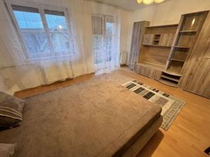 Postel nebo postele na pokoji v ubytování Quelle Studio + 8 fotografií