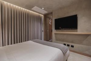 Kuuna Luxury Stays by Wynwood House TV 또는 엔터테인먼트 센터