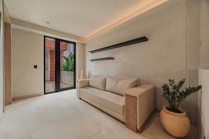 Kuuna Luxury Stays by Wynwood House 객실 침대