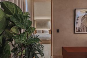 Kuuna Luxury Stays by Wynwood House 객실 침대