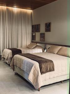 Katil atau katil-katil dalam bilik di Café Palace Hotel