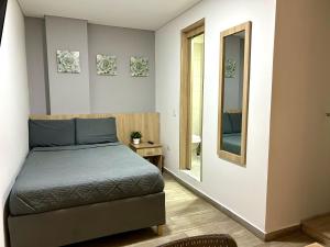 Postel nebo postele na pokoji v ubytování Hostelfc Teusaquillo