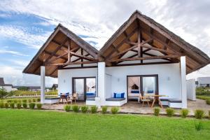 Zahrada ubytování Mequfi Beach Resort